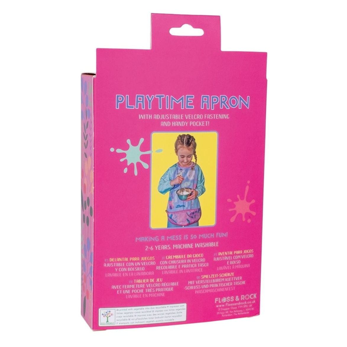 Pink packaging of a playtime apron with a child illustration on a white background