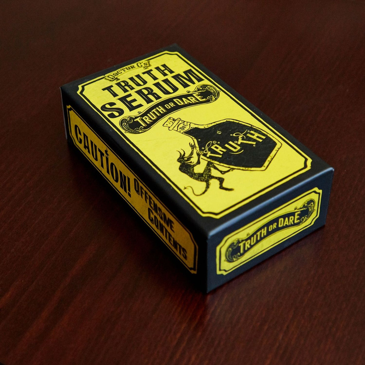 Box of Truth Serum on a wooden surface