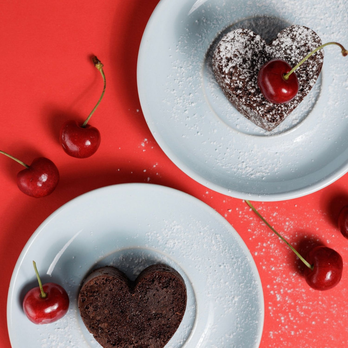 A flexible heart shaped ice mould used for baking and it releases perfectly formed heart brownies, showcasing the easy-release, non-stick material.