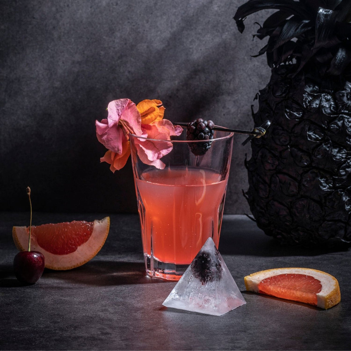 Pyramid ice cube tray for statement drinks. Large geometric ice with a luxury feel, BPA free silicone and dishwasher safe.