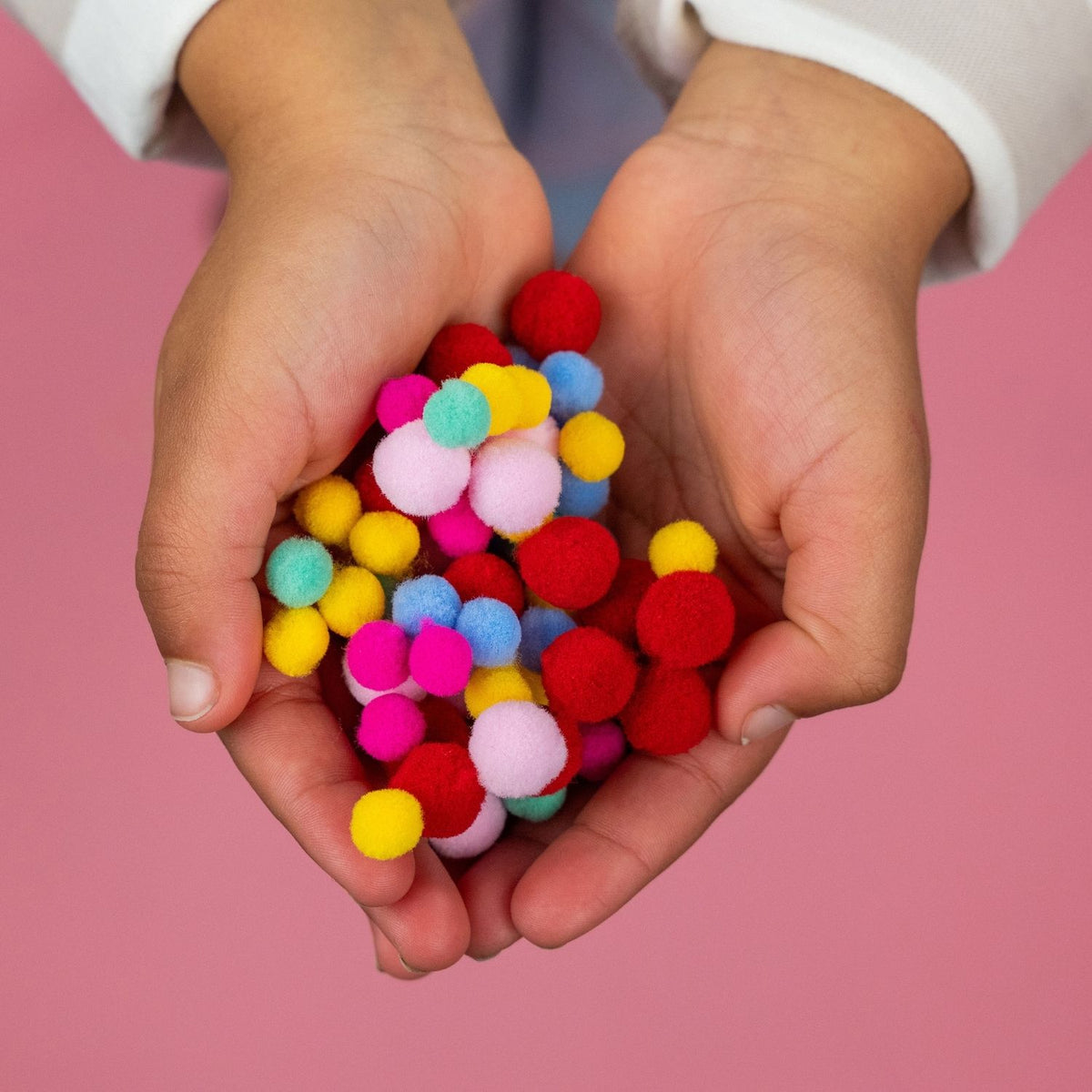 Decorate a vibrant rainbow with this eco-friendly pom pom craft kit which includes 200 pom poms. Made with FSC-certified card and vegetable inks. Simple peel-and-stick fun for ages 3+.