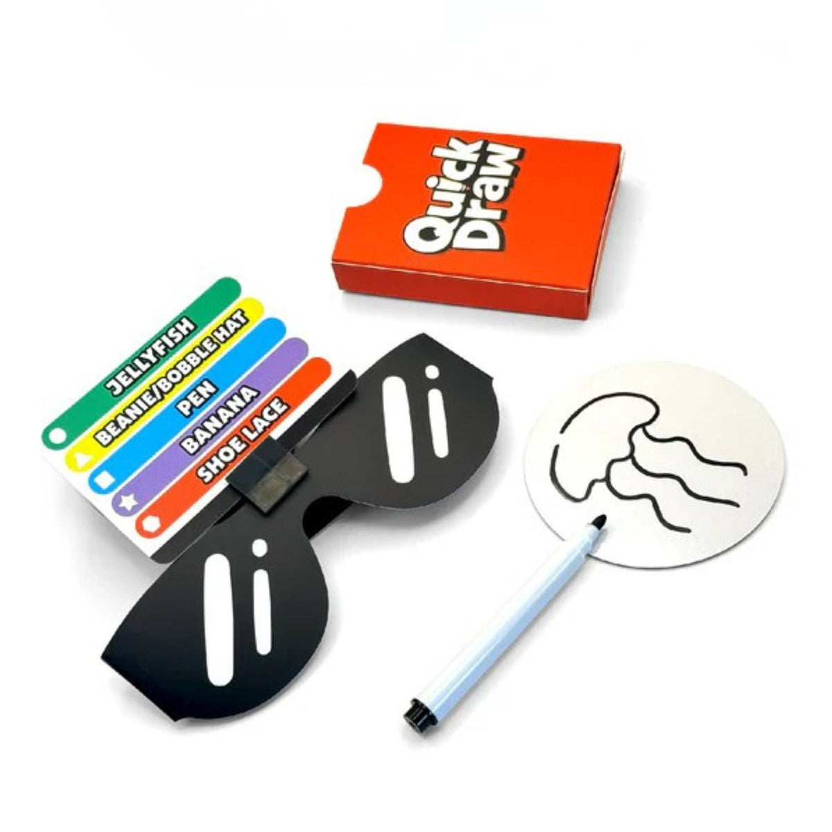 An overhead view of the Quick Draw game contents: 5 wipe-clean drawing pads, 5 dry-erase pens, a deck of cards, blackout shades, a scoring board, and a central spinner.