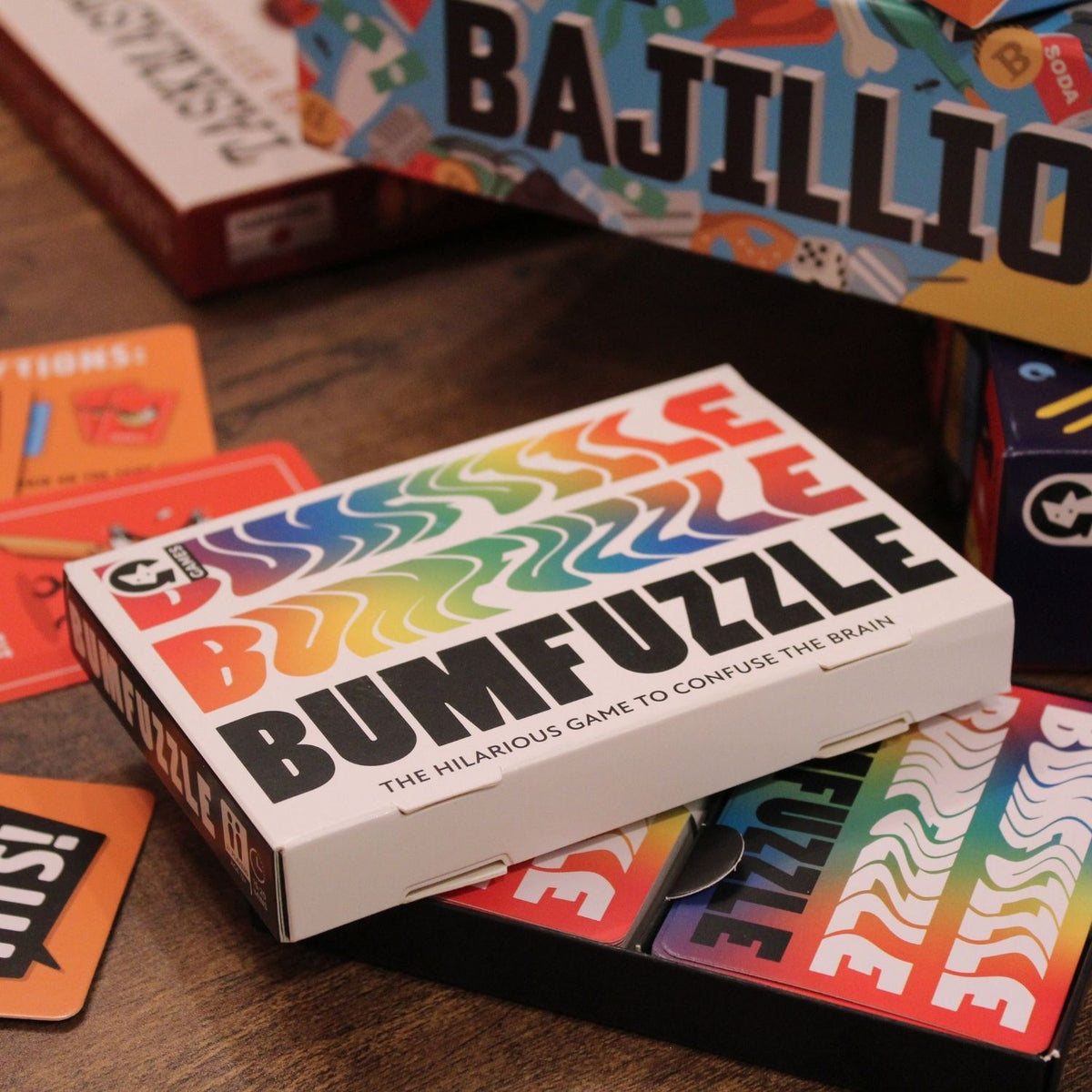 Bumfuzzle game box with colorful text on a wooden surface