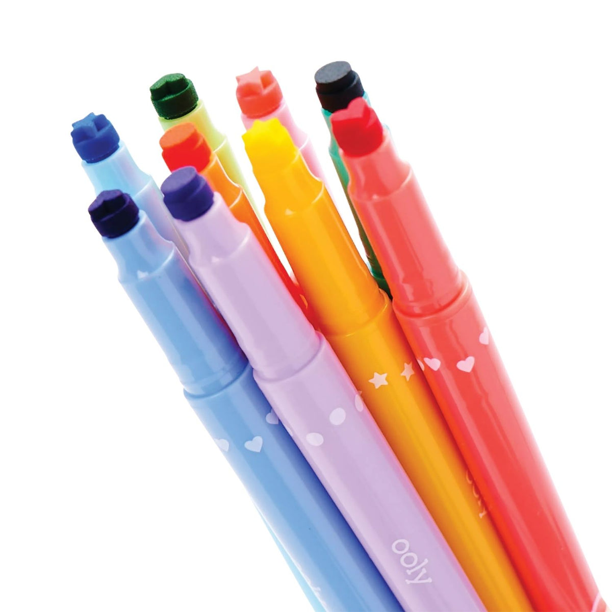 close up of the markers pre-inked stamp tips showing shapes like stars and hearts. No stamp pads required.