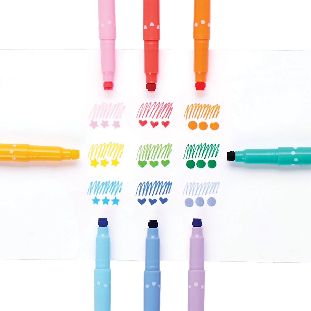 All 9 markers arranged in a row to show the variety of ink colours and the assorted stamp shapes, including dots, hearts and stars.
