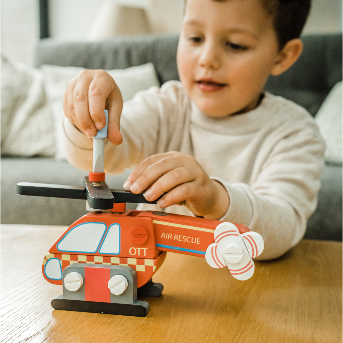 2-in-1 building puzzle and flying vehicle! Crafted from durable solid wood with non-toxic paints. The perfect gift for young builders and vehicle fans.
